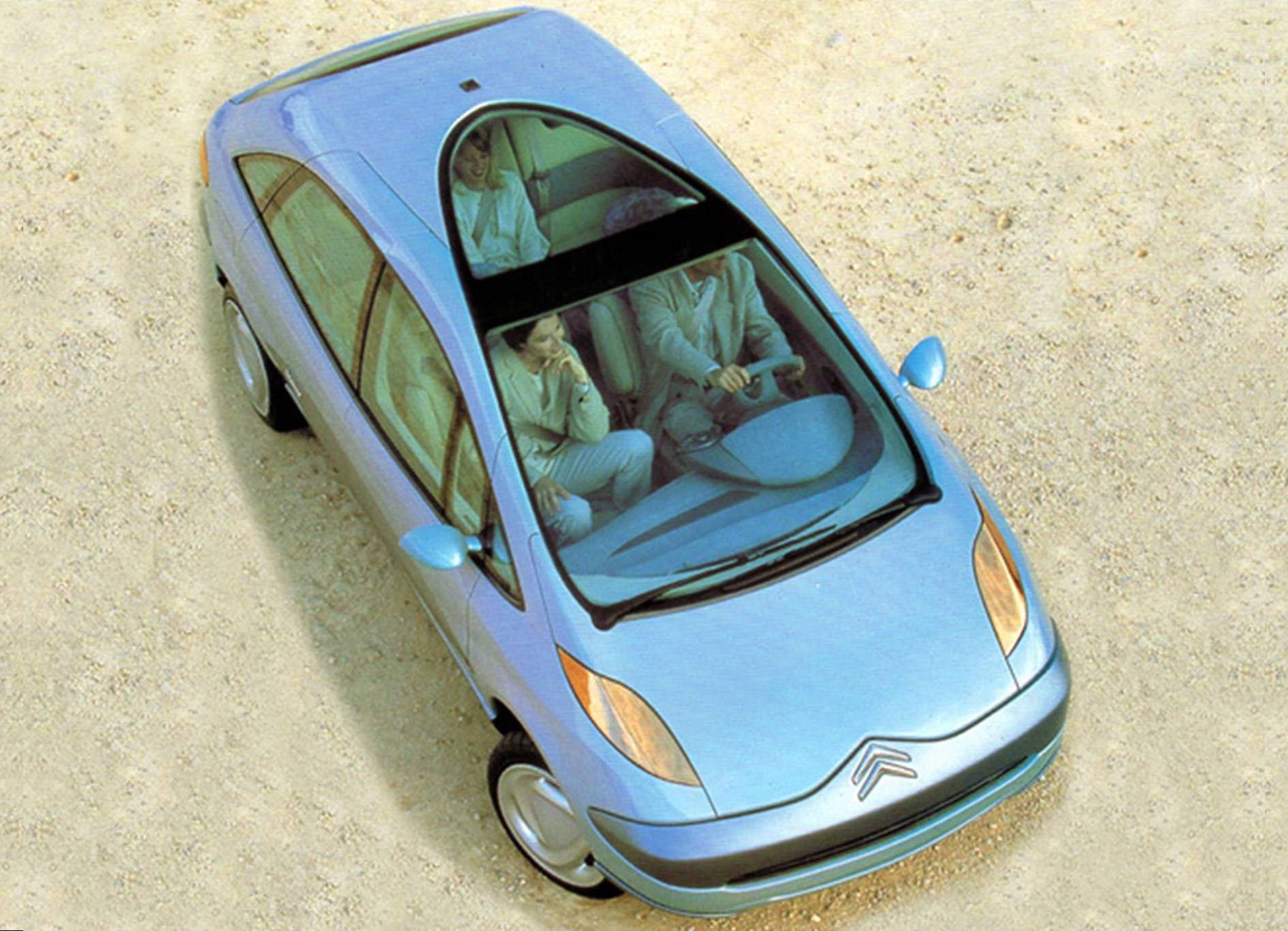greyish blue car, viewed from above